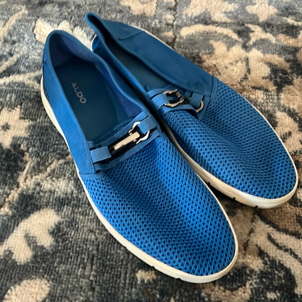 Blue sneakers used but still good in condition